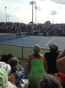 Nadal's superfan (in green dress) savors his doubles win!